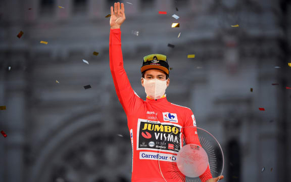 Team Jumbo's Slovenian rider Primoz Roglic celebrates on the podium after winning the 2020 La Vuelta cycling tour of Spain at the end of the 18th and final stage, a 124,2-km race from the Zarzuela racecourse to central Madrid, on November 8, 2020.