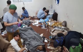 MSF staff treat wounded colleagues and patients in the Kunduz hospital.