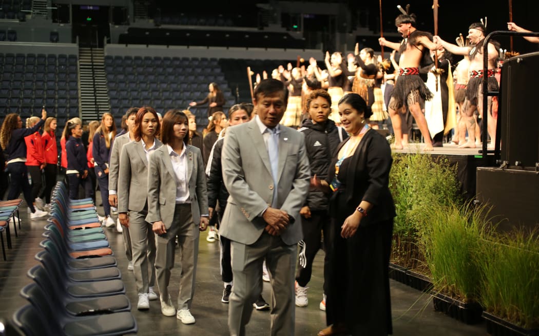 Football teams taking their seat at the pōwhiri for the FIFA Women's World Cup.