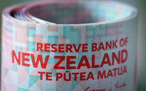 New Zealand dollars with Reserve Bank of New Zealand text.