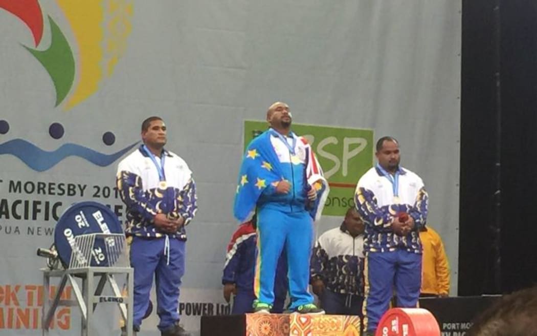 Telupe Iosefa, Tuvalu powerlifter, wins Tuvalu's first ever Pacific Games gold medal.