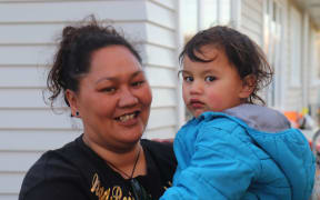 Kotrio Hawaikirangi with her two-year-old son Keretau Pitman. She lived in a motel but now lives in a papakainga.