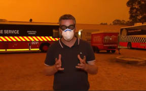 The BBC's Phil Mercer witnessed a dust storm "coming towards us like a monster" in NSW as bushfires across Australia continued to burn.