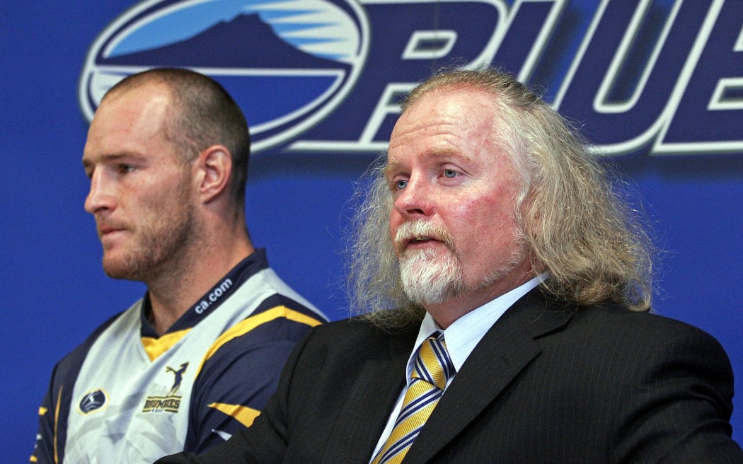 Brumbies captain Stirling Mortlock (L) and coach Laurie Fisher (R) at the media conference after the Super 14 rugby union match between the Blues and the Brumbies at Eden Park, Auckland on Saturday 18 March 2006. The Blues won the game 26:15. Photo: Andy Song/PHOTOSPORT


150375