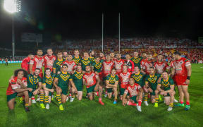 Australian and Tongan players get together for a photo after the Tonga-Australia rugby league Test, Auckland 2018.