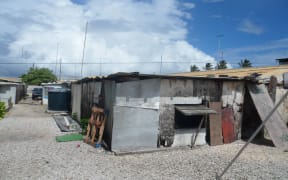 Overcrowded and dilapidated housing conditions are the norm for islanders from Kwajalein's "mid-corridor" who were evacuated 50 years ago to make way for missile testing. Marshall Islands.