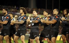 Isaac Luke leads the haka for the Kiwis against the Kangaroos in the Anzac Test in Canberra.