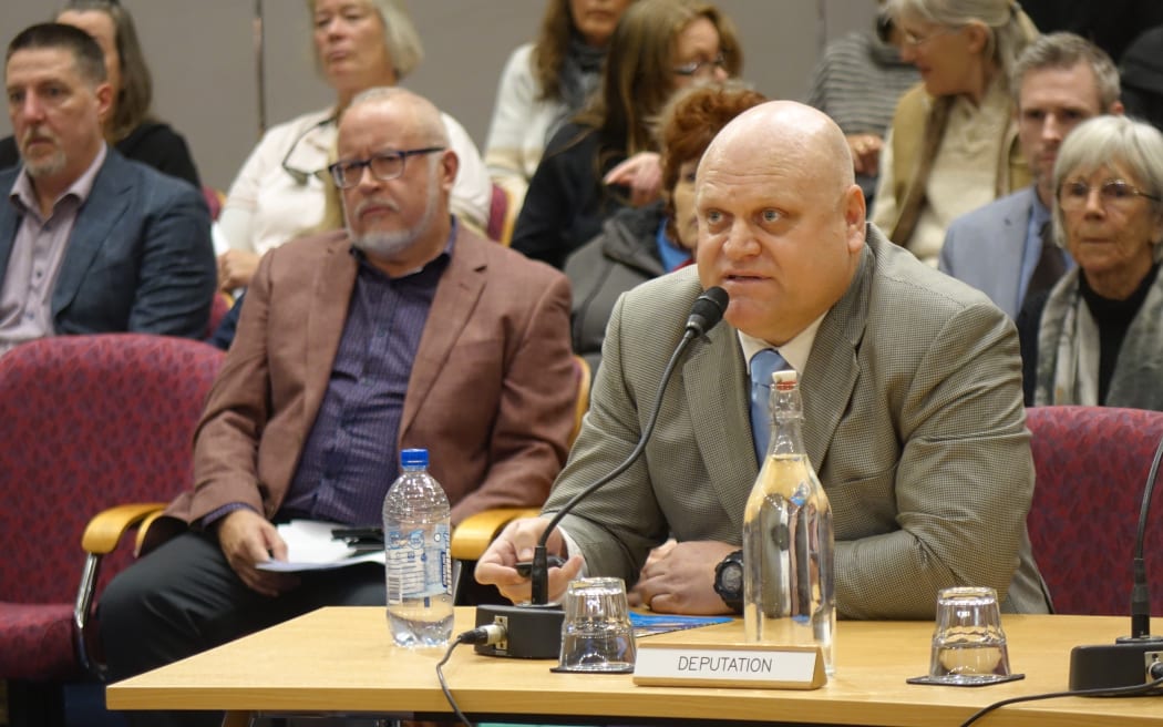 Kane Titchener from Fluoride Free New Zealand speaks at a council meeting in New Plymouth.