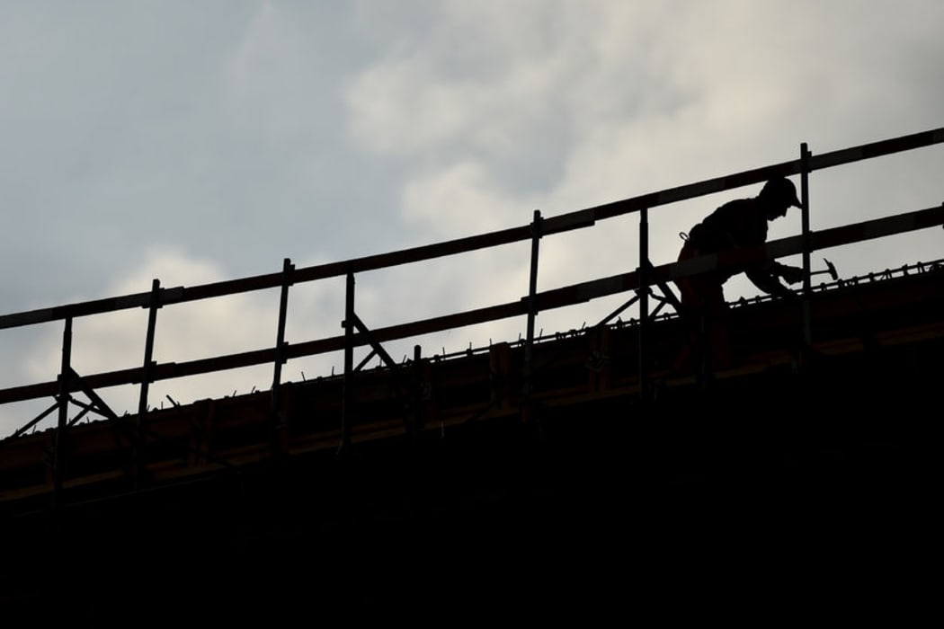 Silhouette of a construction worker