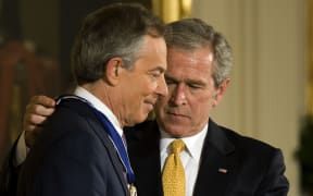 Discussions are taking place over the publication of confidential correspondence between Mr Bush and Mr Blair.
