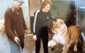 Bill Grey, left with Suzy the lion.