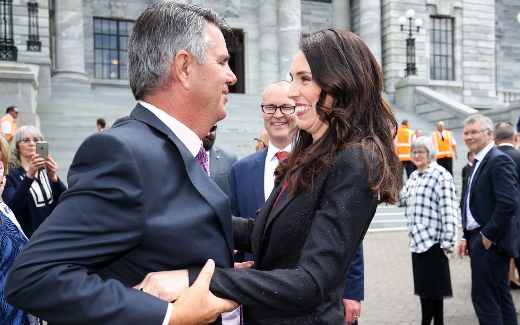 WELLINGTON, NEW ZEALAND - OCTOBER 26:  Prime Minister Jacinda Ardern hugs her father Ross Ardern at Parliament following a swearing-in ceremony at Government House on October 26, 2017 in Wellington, New Zealand. After failing to win an outright majority in the general election on September 23, Labour entered into a coalition agreement with the New Zealand First and Greens parties.  (Photo by Hagen Hopkins/Getty Images)