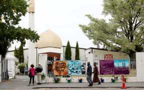 Members of the Muslim community arrive at the Al Noor mosque on the 15 March 2020, the anniversary of the terror attack.
