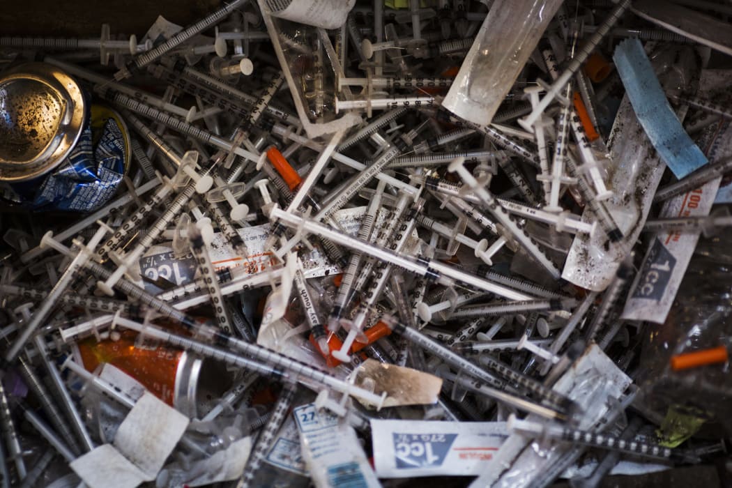 Discarded needles are seen at a heroin encampment in the Kensington neighborhood of Philadelphia, Pennsylvania.