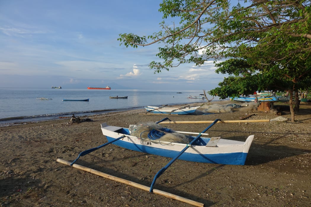 Traditional boats on the Dili foreshore