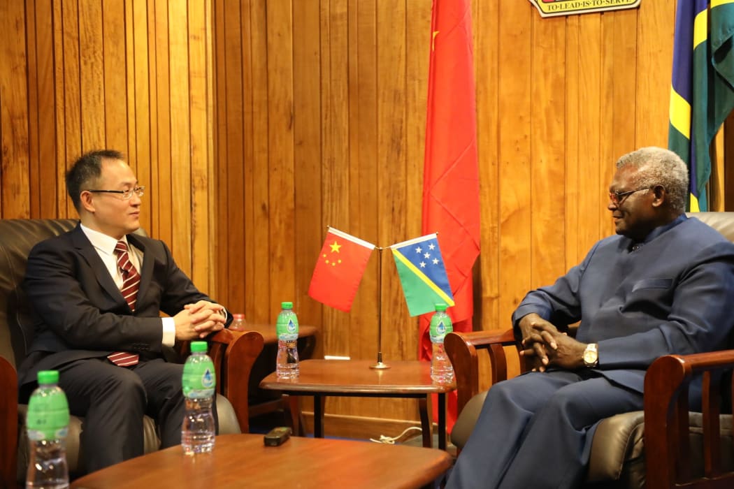 Solomon Islands prime minister Manasseh Sogavare (right) with Li Ming, China's first ambassador to the Solomon Islands.