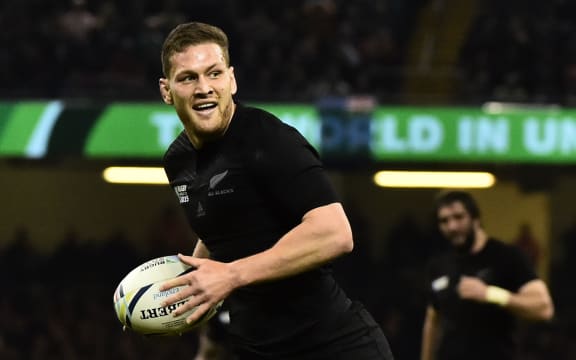 Tawera Kerr-Barlow took part in his first test during the Rugby World Cup match between New Zealand and France.