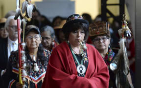 The opening procession is shown at the closing ceremony for the National Inquiry into Missing and Murdered Indigenous Women and Girls in Gatineau, Quebec, on Monday, June 3, 2019.