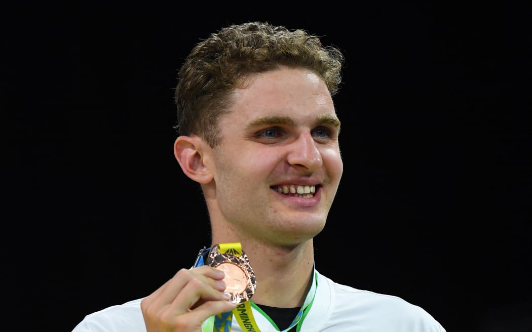 Bronze medalist New Zealand's Lewis Clareburt poses during the medal presentation ceremony for the men's 200m individual medley swimming final at the Sandwell Aquatics Centre, on day six of the Commonwealth Games in Birmingham.