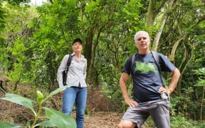 Edward Duff and Amanda de Krester in the threatened Kohimarama Forest.