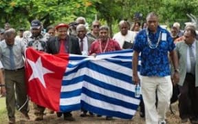 The United Liberation Movement for West Papua converges on the Melanesian Spearhead Group secretariat.