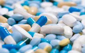 Heap of medicine pills.  Background made from colorful pills and capsules