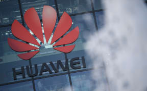 The logo of Chinese company Huawei is seen at their main UK offices in Reading, west of London.
