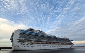 The Ruby Princess cruise ship departs from Port Kembla, some 80 kilometres south of Sydney, on April 23, 2020, after virus-free crew members disembarked to begin the process of repatriation to their home countries.