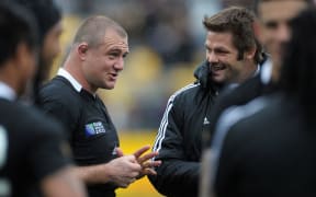 Tony Woodcock talks to Richie McCaw after the All Blacks beat Canada at the 2011 Rugby World Cup in Wellington on Sunday, 2 October 2011. Photo: Dave Lintott / photosport.co.nz