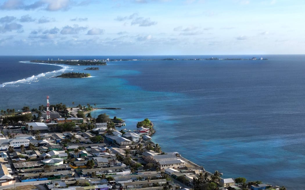 The main U.S. military site in the Marshall Islands’ Kwajalein Atoll seen in the distance from the nearby island of Ebeye
