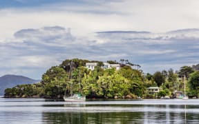 Stewart Island aka Rakiura, the third largest island in the country. Oban, view across,Golden Bay.