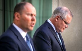 Australian Treasurer Josh Frydenberg, left, and Prime Minister Scott Morrison. Canberra, March 2021.