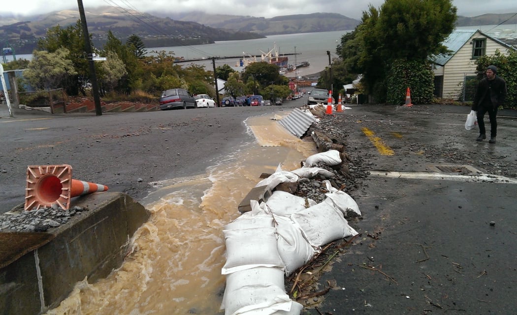 A makeshift barrier to protect houses in Lyttelton.