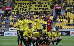 The Wellington Phoenix pose for a team photo in the A-League football match vs Sydney FC at Westpac Stadium on Sunday 19 December 2015. Copyright Photo by Marty Melville / www.Photosport.nz