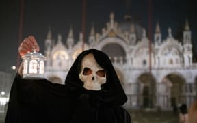 A group of Venetians dressed up like old doctors at the time when in Venice there was the plague, celebrate the end of the Venice Carnival, despite the facts it has been stopped on Sunday due to Coronavirus.