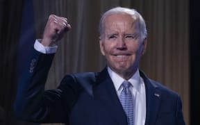 US President Joe Biden acknowledges the crowd during an event on the creation of new manufacturing jobs at the Washington Hilton in Washington, DC, April 25, 2023. - Biden announced Tuesday his bid "to finish the job" with re-election in 2024. (Photo by Jim WATSON / AFP)