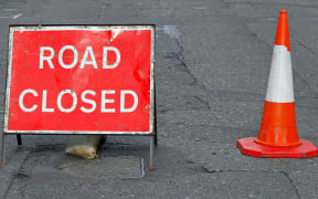 Road closed sign, road cone, generic