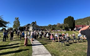 A socially-distanced crowd at the outdoor protest meeting in Reefton last evening.