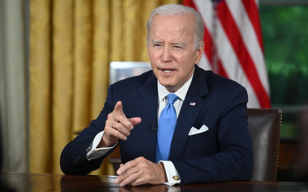 US President Joe Biden addresses the nation on averting default and the Bipartisan Budget Agreement, in the Oval Office of the White House in Washington, DC, June 2, 2023. (Photo by JIM WATSON / POOL / AFP)