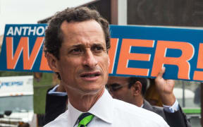Anthony Weiner meets with people on a street corner In Harlem on September 10, 2013