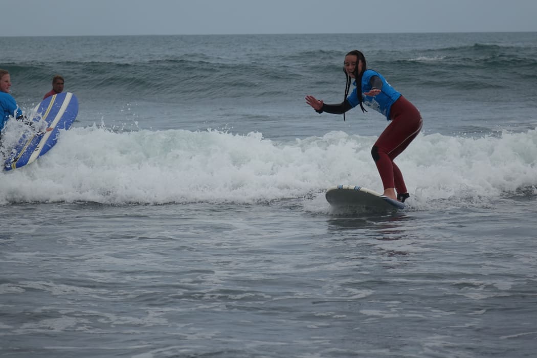 Otorohanga College student Tasmin White enjoyed the surfing experience at Fitzroy beach.