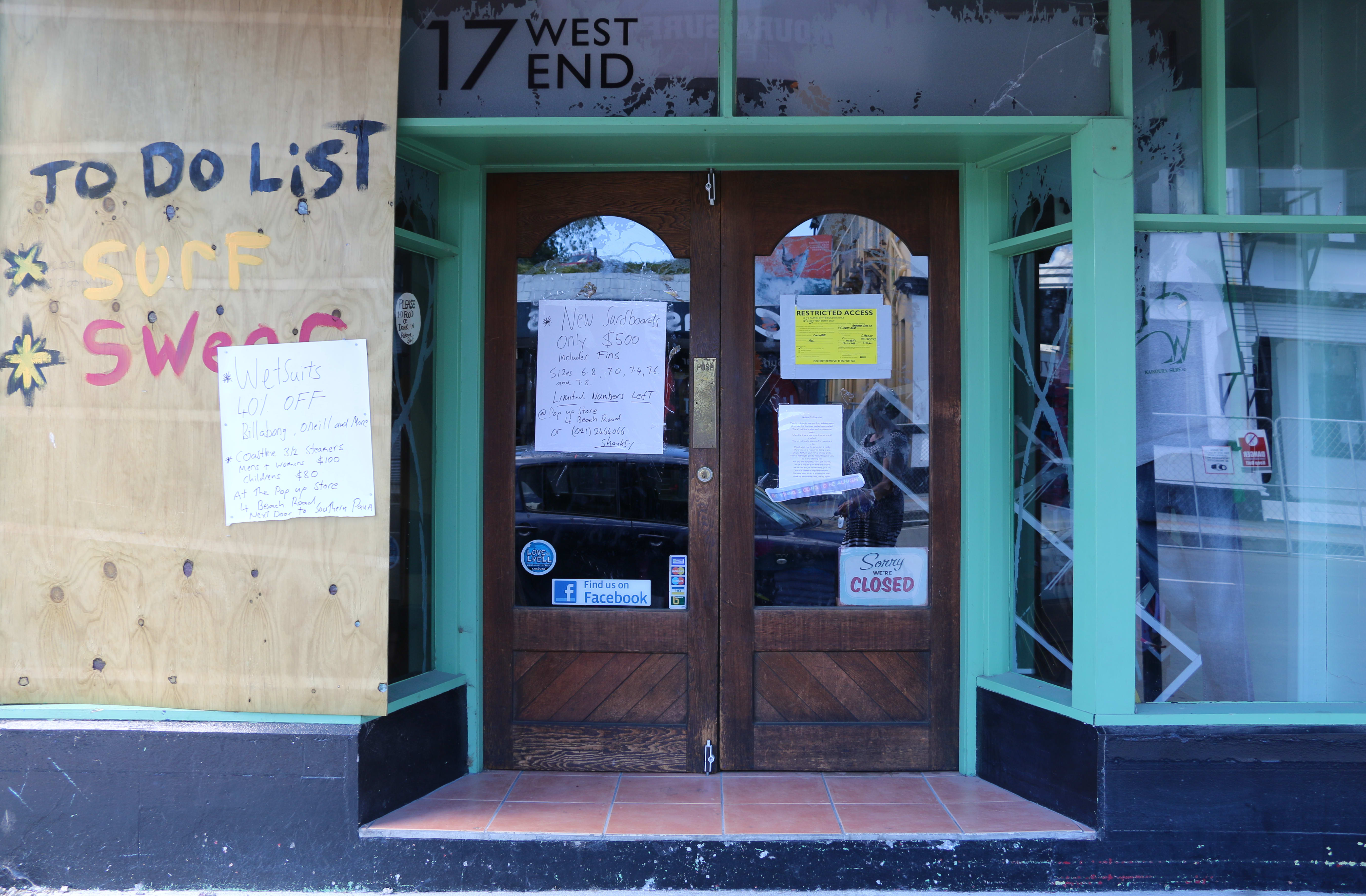 Kaikoura Surf has been shut since the 14 November earthquake. Business owner is Wayne Shanks. His wife Lisa Moffat's shop was next door. The whole building was yellow-stickered so both lost business.