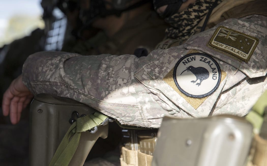 New Zealand Army soldiers inside an Australian Army vehicle during the mission rehearsal exercise for Task Group Taji 3 at RAAF Edinburgh, with about 300 Australian soldiers, sailors and airmen prepared for deployment to Iraq in exercise at RAAF Edinburgh in Adelaide, South Australia.