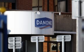 Danone sign on dairy plant in France.
