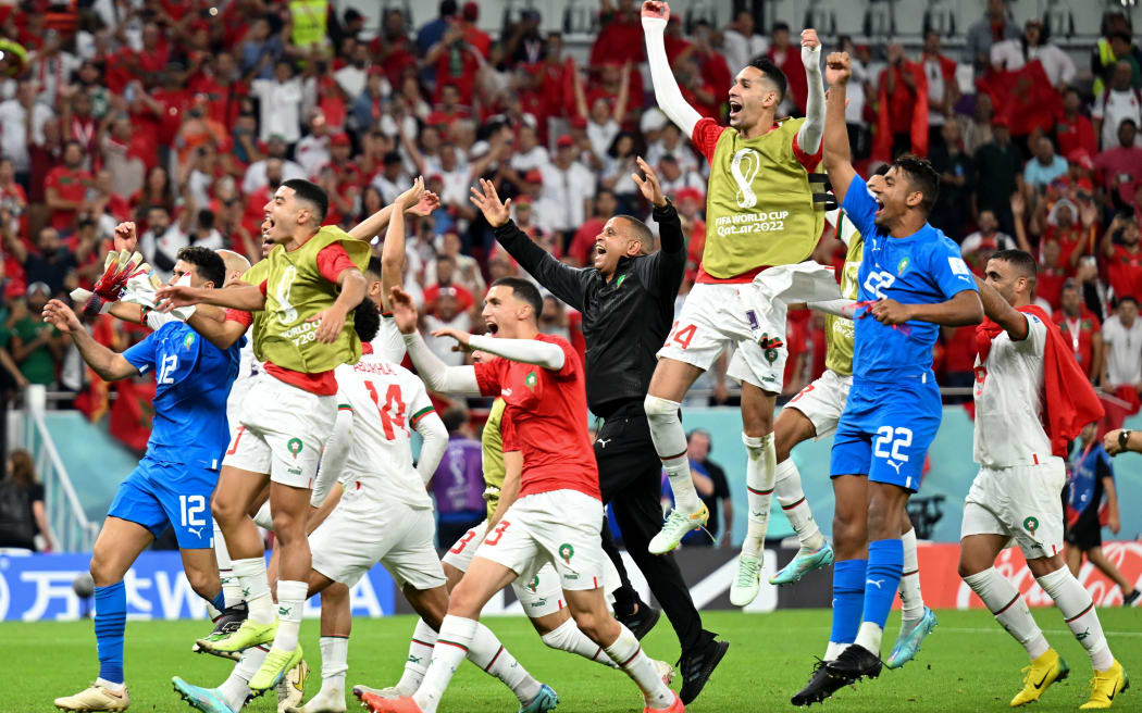 Morocco players celebrate after Morocco's win over Belgium at the Qatar 2022 World Cup