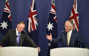 Australia's Prime Minister Malcolm Turnbull (R) and New Zealand Prime Minister John Key (L) hold a joint press conference in Sydney on February 19, 2016.