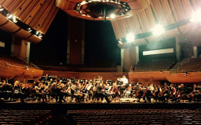 The New Zealand Symphony Orchestra and NZSO National Youth Orchestra in rehearsal with Sir Andrew Davis, to perform Messiaen's 'Illuminations of the Beyond'