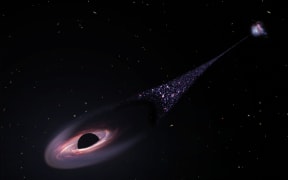 An artist's impression of a runaway supermassive black hole that was ejected from its host galaxy as a result of a tussle between it and two other black holes. As the black hole plows through intergalactic space it compresses tenuous gas in front to it. This precipitates the birth of hot blue stars. This illustration is based on Hubble Space Telescope observations of a 200,000-light-year-long "contrail" of stars behind an escaping black hole.
