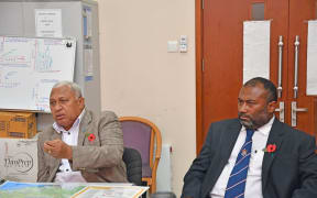 Prime Minister Frank Bainimarama and Health Minister Ifereimi Waqainabete.