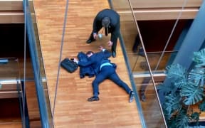 UK Independence Party MEP, Steven Woolfe, lying face-down on a walk-way inside the European Parliament building in Strasbourg in eastern France. October 6 2016